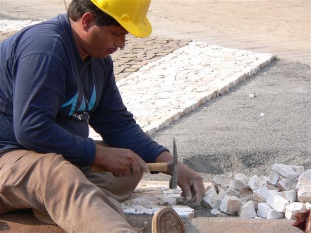 Man assembling rocks