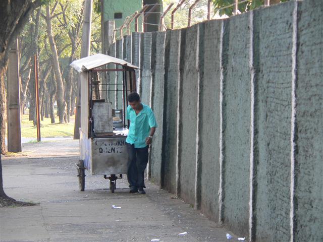 Street Vendor moving shop into place
