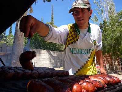 Selling "chorizo" sausages in bread rolls.