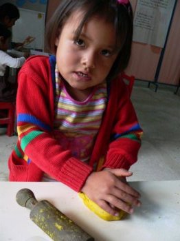 Girl playing with plasticine
