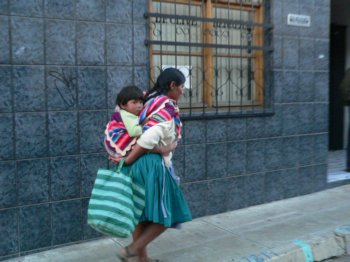 mother carrying child