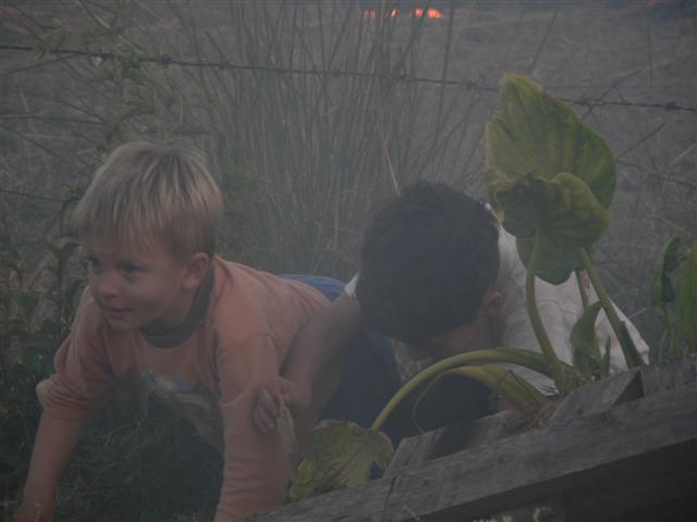 Two boys in smoke