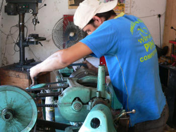 cutting the pin with a hacksaw