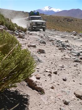 jeep driving down road