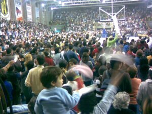 People pack the stadium to hear Carlos Anacondia