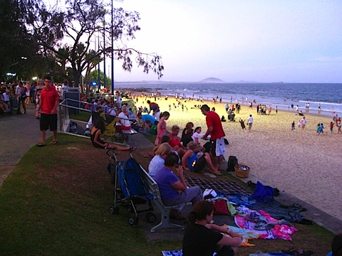 People lining the beach