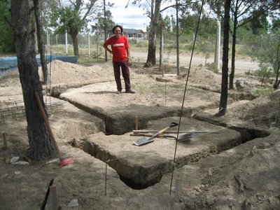 The dug foundations of the house.
