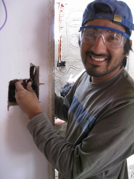 Paul making holes in the wall