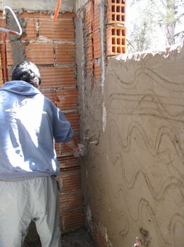 Rendering the walls with concrete