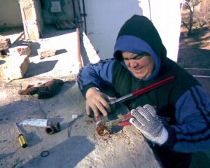 Ruben helping me to fix the burst pipe