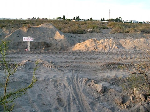 Looking down the trail, over the new road